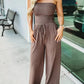 🔥Effen kleur gesmokte jumpsuit met blote schouders