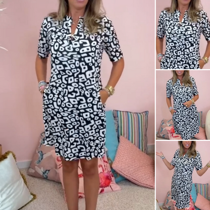 Casual damesjurk met korte mouwen en V-hals print